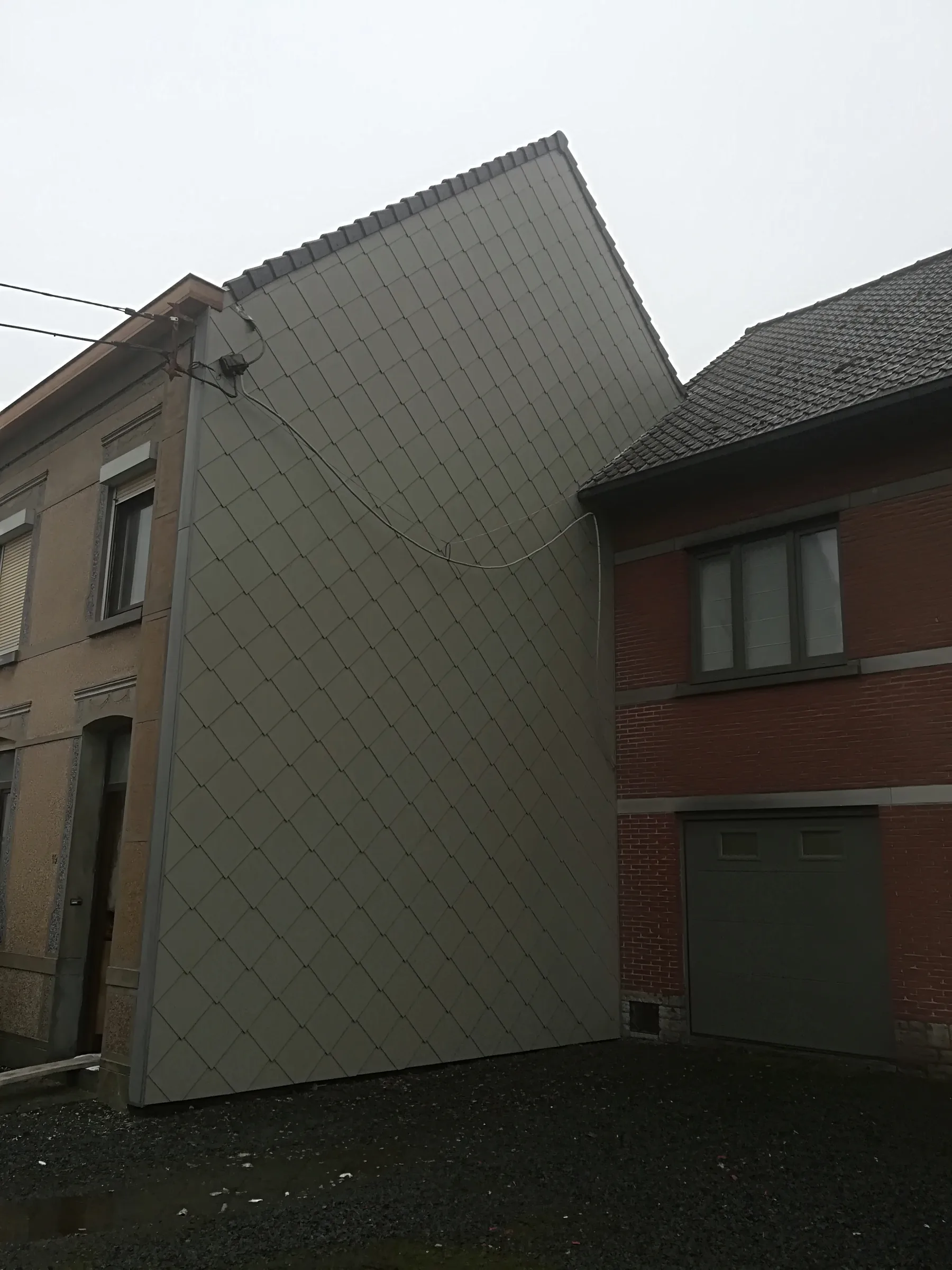Pignon habillé d'ardoises posées en losange